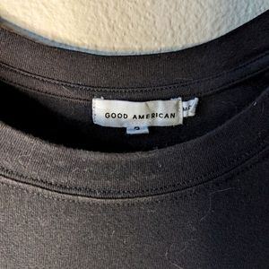 Strong shoulder black tee. Good American size 3.